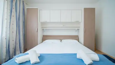 Krevet ili kreveti u jedinici u objektu Apartments Ana & Bogdan