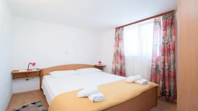 Krevet ili kreveti u jedinici u objektu Apartments Ana & Bogdan