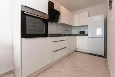 Kuhinja ili čajna kuhinja u objektu Apartment and Rooms Tatijana