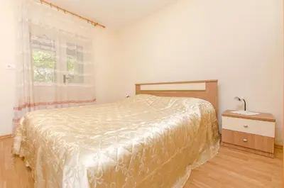 Krevet ili kreveti u jedinici u objektu Apartments Bozjidar