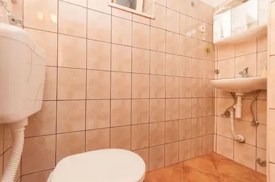 Kupaonica u objektu House Vela Lozna