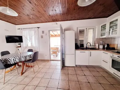 Kuhinja ili čajna kuhinja u objektu Family friendly house with a swimming pool Praznica, Brac - 24570