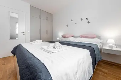 Krevet ili kreveti u jedinici u objektu Theo Seaview Apartments Makarska