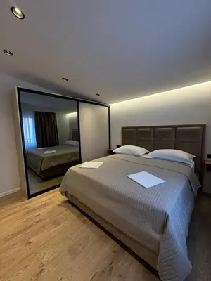 Krevet ili kreveti u jedinici u objektu Artemis Poolhouse Apartments