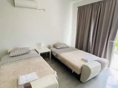 Krevet ili kreveti u jedinici u objektu Villa Brazza - Two Bedroom Apartment 1