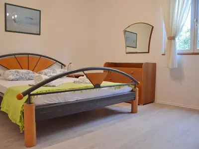 Krevet ili kreveti u jedinici u objektu Blissful Bay Apartments Vrboska - Two Bedroom Apartment with Terrace