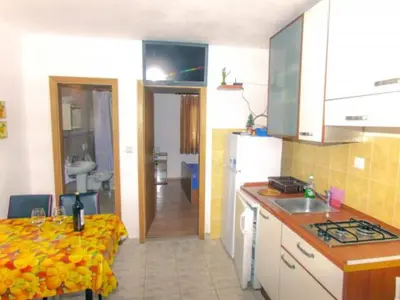 Kuhinja ili čajna kuhinja u objektu Beachfront Apartments Pla a - One Bedroom Apartment A3