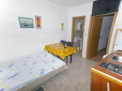 Kuhinja ili čajna kuhinja u objektu Beachfront Apartments Pla a - One Bedroom Apartment A3