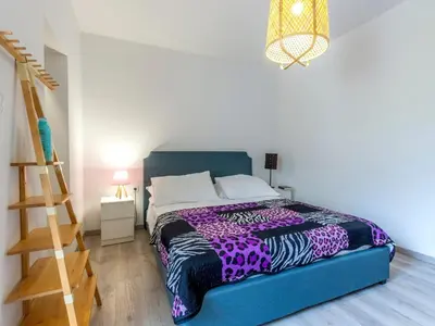 Krevet ili kreveti u jedinici u objektu Serene Rural Villa with Pool, Sun Deck, and Children's Play Area - Five Bedroom Villa