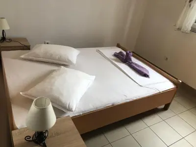 Krevet ili kreveti u jedinici u objektu Apartmani Villa Borzic - One Bedroom Apartment with Terarce and Sea View