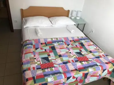 Krevet ili kreveti u jedinici u objektu Apartmani Villa Borzic - One Bedroom Apartment with Terarce and Sea View