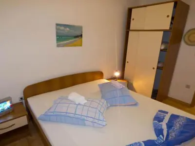 Krevet ili kreveti u jedinici u objektu Beachfront Apartments Pla a - Two Bedroom Apartment A4