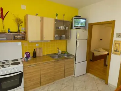 Kuhinja ili čajna kuhinja u objektu Beachfront Apartments Pla a - Two Bedroom Apartment A4