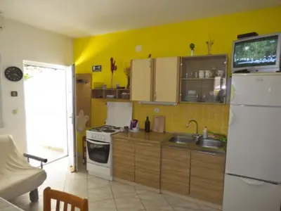 Kuhinja ili čajna kuhinja u objektu Beachfront Apartments Pla a - Two Bedroom Apartment A4