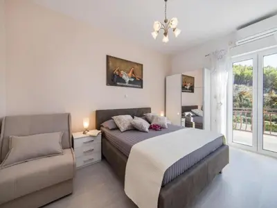 Krevet ili kreveti u jedinici u objektu Apartments Tafra - One Bedroom Apartment