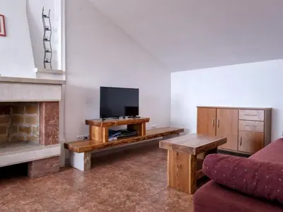 TV i/ili zabavni centar u objektu Dolac Green Side Apartments - Two Bedroom Apartment 2