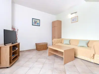 TV i/ili zabavni centar u objektu Dolac Green Side Apartments - Two Bedroom Apartment 1