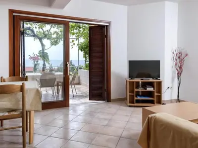 TV i/ili zabavni centar u objektu Dolac Green Side Apartments - Two Bedroom Apartment 1