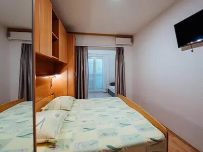 Krevet ili kreveti u jedinici u objektu Apartments Pezo - Studio Apartment Tina 5