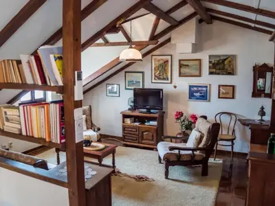 TV i/ili zabavni centar u objektu Stone House Seaside Retreat on Bra Island - Two Bedroom Apartment 1
