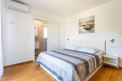 Krevet ili kreveti u jedinici u objektu Apartman Nikša