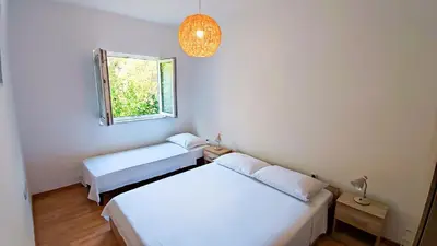 Krevet ili kreveti u jedinici u objektu Leana Apartments , island of Brač