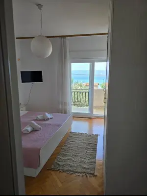 Krevet ili kreveti u jedinici u objektu Apartments Mila & Johnny