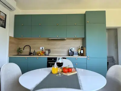 Kuhinja ili čajna kuhinja u objektu Apartman Domnius