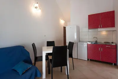 Kuhinja ili čajna kuhinja u objektu APARTMENTS BRUNO 3 - two-room penthouse apartment - wonderful view of the sea - the best location, first row to the beach - 10 minutes from Supetar ferry port - free secured parking - facilities nearby