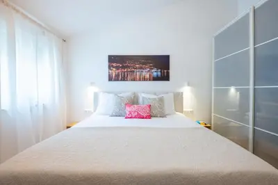 Krevet ili kreveti u jedinici u objektu The Penthouse Harmony Beachfront with Hot Tub
