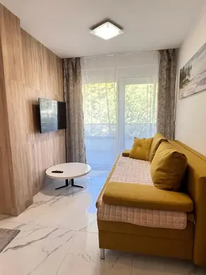 TV i/ili zabavni centar u objektu Apartmani Chiara