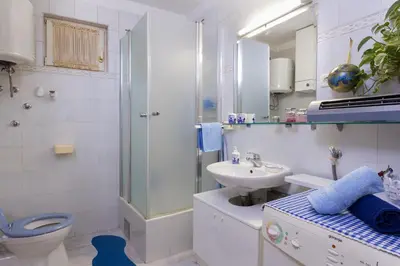 Kupaonica u objektu Arca, Apartment with Sea View and Free Parking