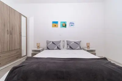 Krevet ili kreveti u jedinici u objektu Apartments Cezar