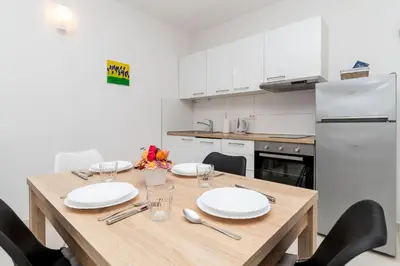 Kuhinja ili čajna kuhinja u objektu Apartments Cezar