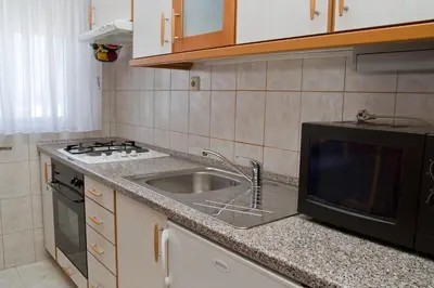 Kuhinja ili čajna kuhinja u objektu Sunshine Apartments Podstrana