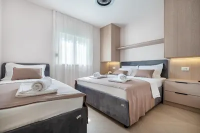 Krevet ili kreveti u jedinici u objektu Apartment LEO