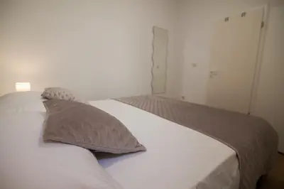Krevet ili kreveti u jedinici u objektu Domus Apartments - Free Private Parking