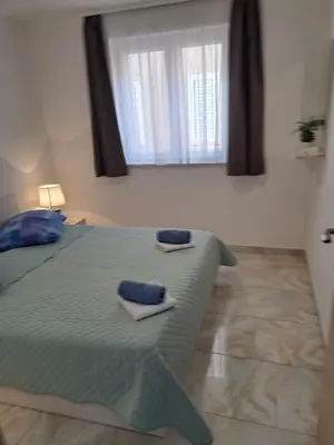 Krevet ili kreveti u jedinici u objektu Apartmani Sanda