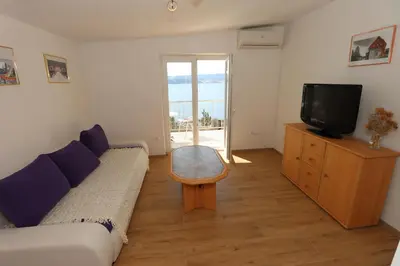 TV i/ili zabavni centar u objektu Apartments Miro - Front Row Sea View