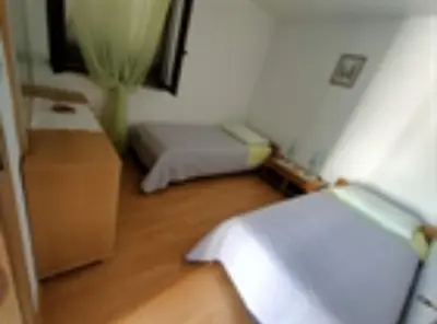 Krevet ili kreveti u jedinici u objektu Apartments Ivan Supetar
