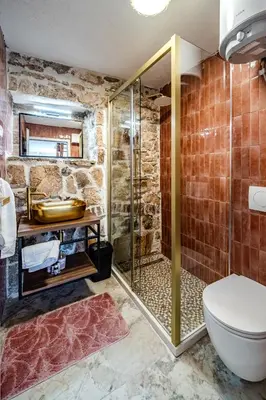 Kupaonica u objektu Luxury Villa Unikat with Seaview & Jacuzzi