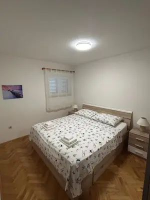 Krevet ili kreveti u jedinici u objektu Apartman Ivana