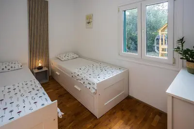Krevet ili kreveti u jedinici u objektu Vacation House Lavanda NEW! Heated pool