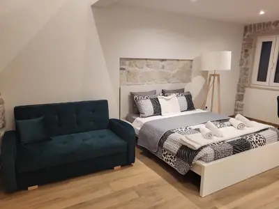 Krevet ili kreveti u jedinici u objektu Old town Bol apartments