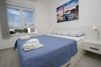 Krevet ili kreveti u jedinici u objektu Apartments Marko & Luka