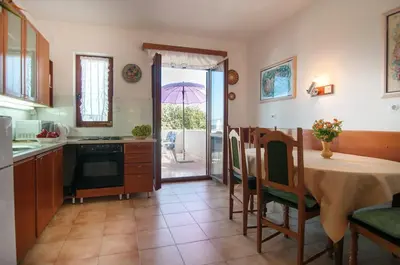 Kuhinja ili čajna kuhinja u objektu Apartment with sea view terrace