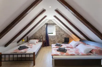 Krevet ili kreveti u jedinici u objektu Holiday House Tramonto with Pool, Sunset View & Pet Friendly, Donji Humac, Brač