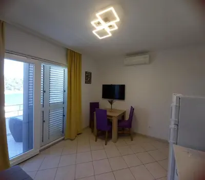 TV i/ili zabavni centar u objektu Apartments Rogošić