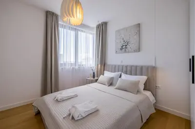 Krevet ili kreveti u jedinici u objektu Make Memories by the Sea - Apartments Storia