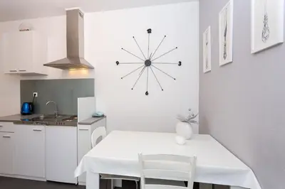 Kuhinja ili čajna kuhinja u objektu Apartments Magdales